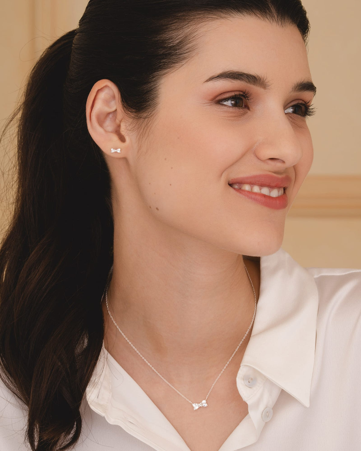 Sterling Silver and Cubic Zirconia Simple Bow Studs