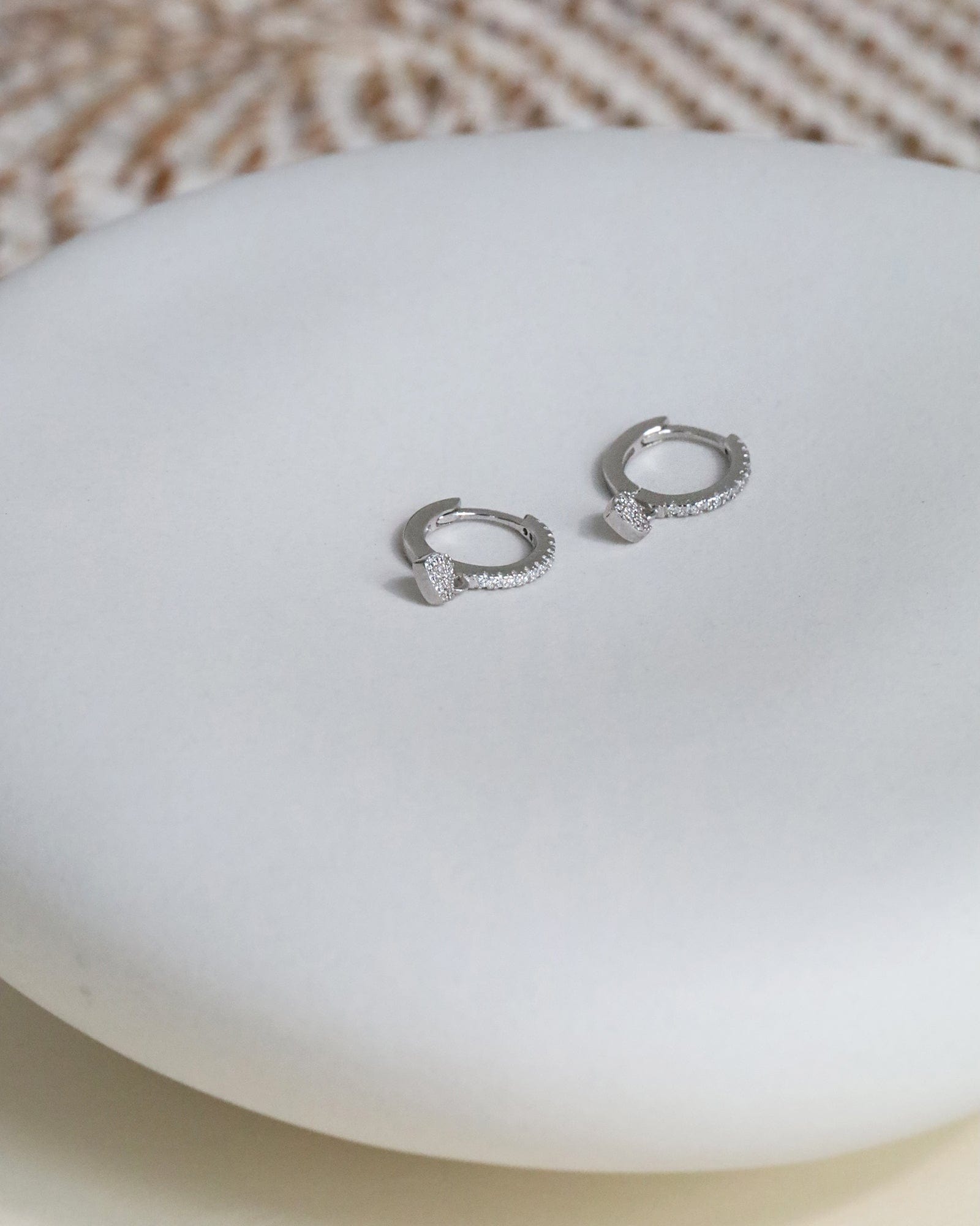 Sterling Silver and Cubic Zirconia Huggy Hoops with Heart Charm