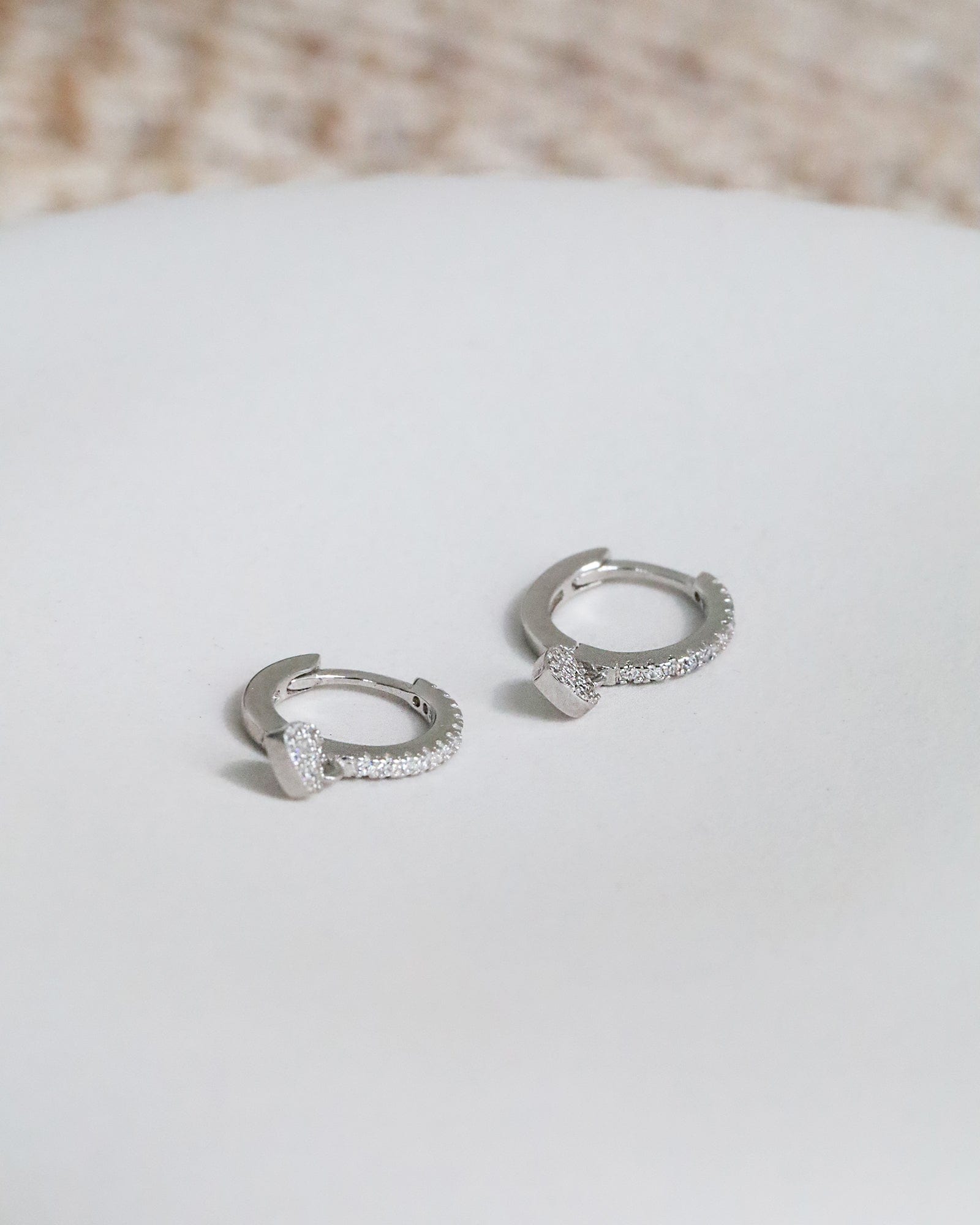 Sterling Silver and Cubic Zirconia Huggy Hoops with Heart Charm