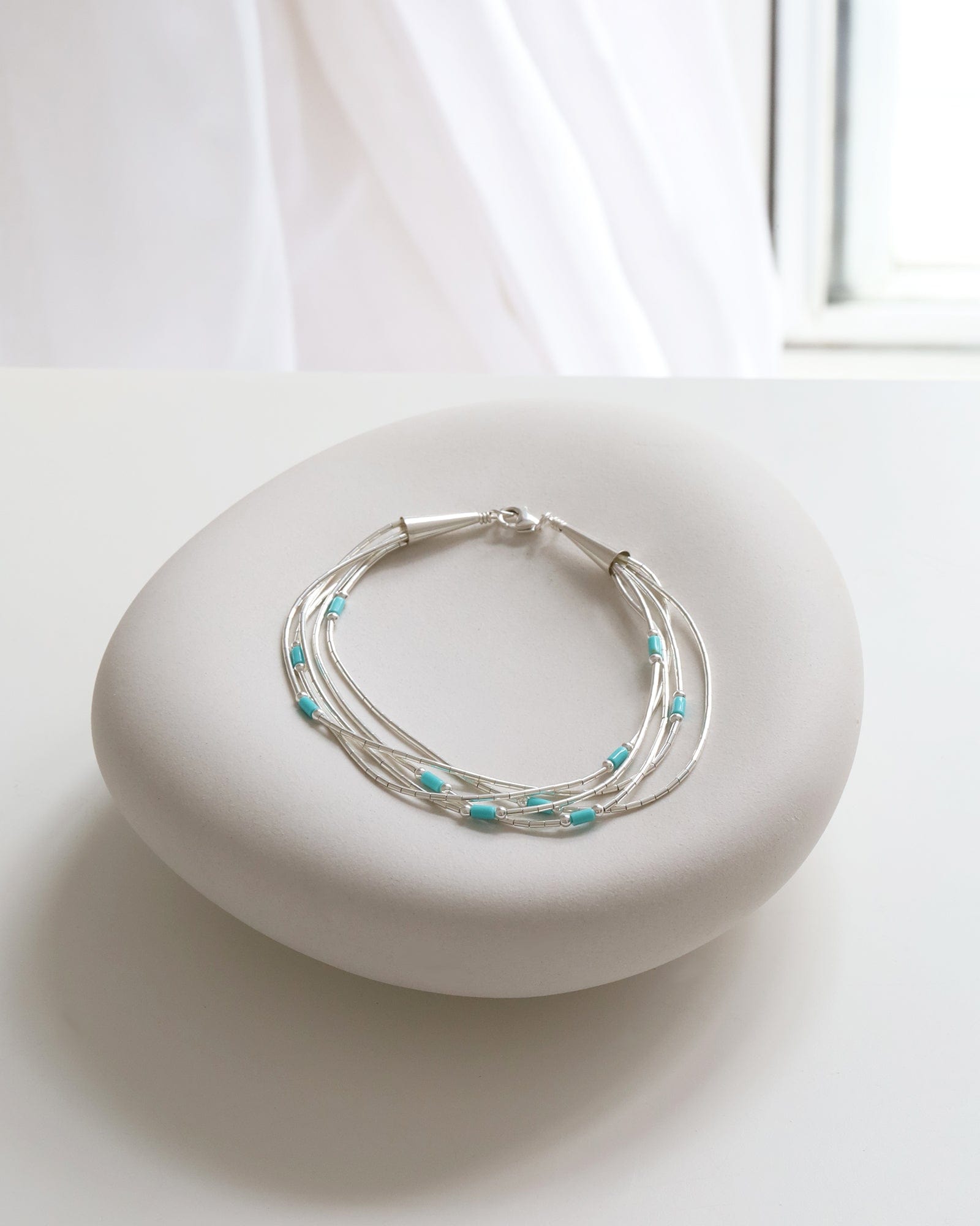 5 Strand Liquid Silver and Turquoise Bracelet