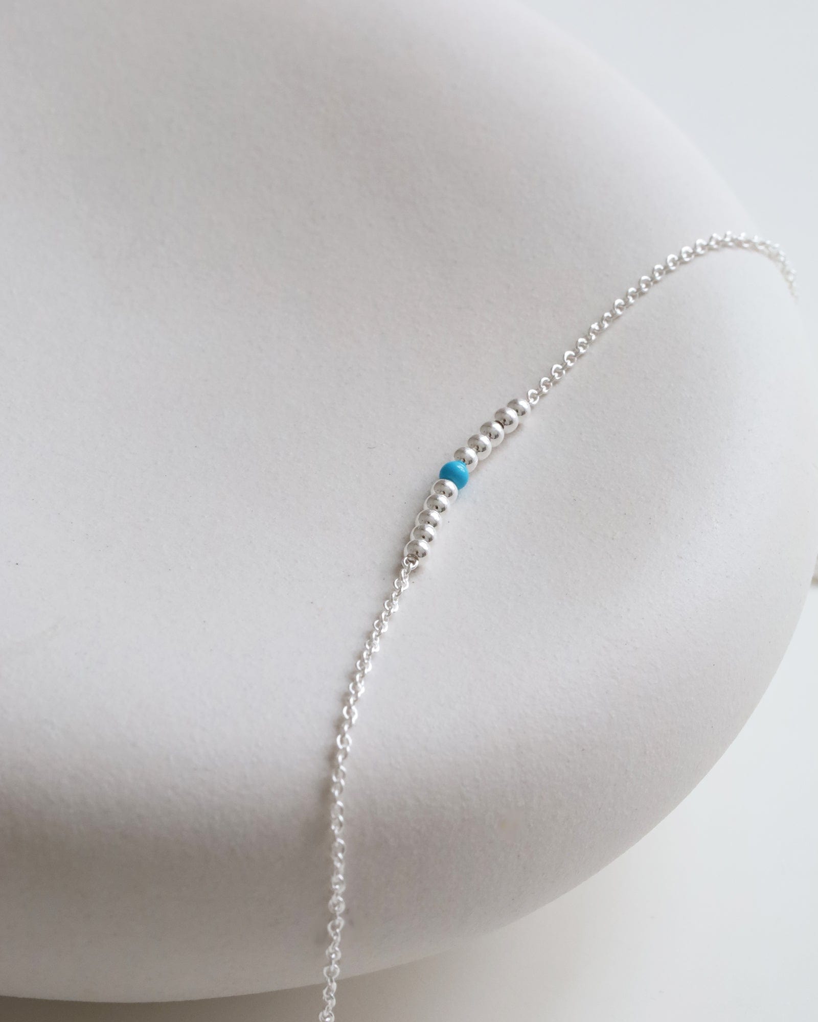 Sterling Silver Fine Chain and Ball Bracelet with Blue Bead
