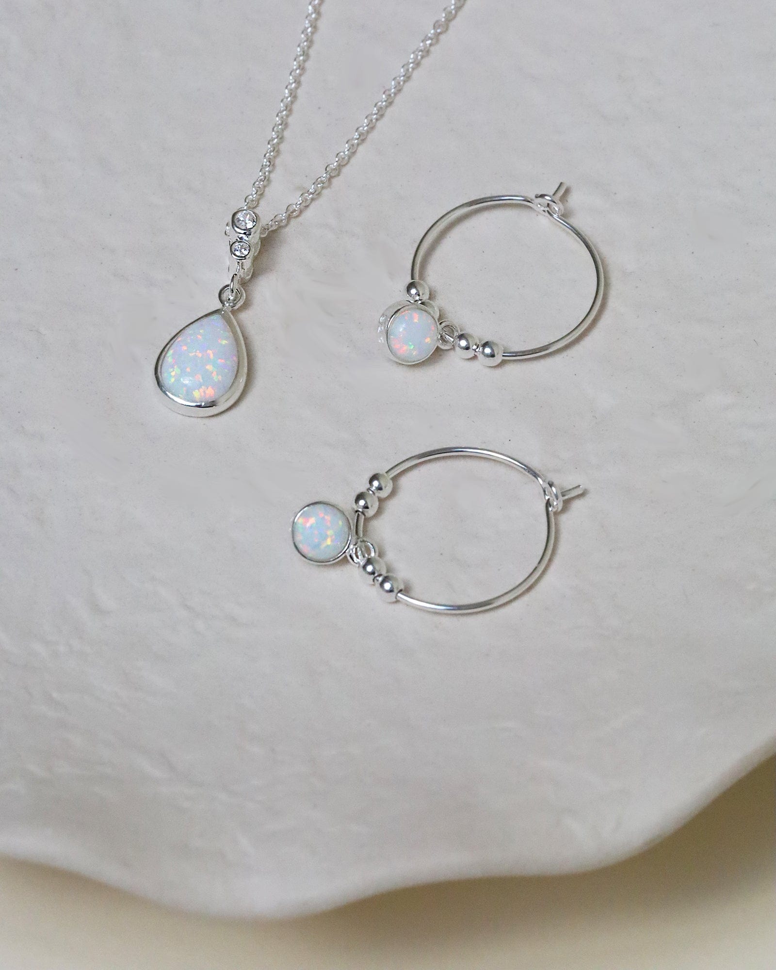 Sterling Silver and Opal Teardrop Necklace with Cubic Zirconia Set Bale