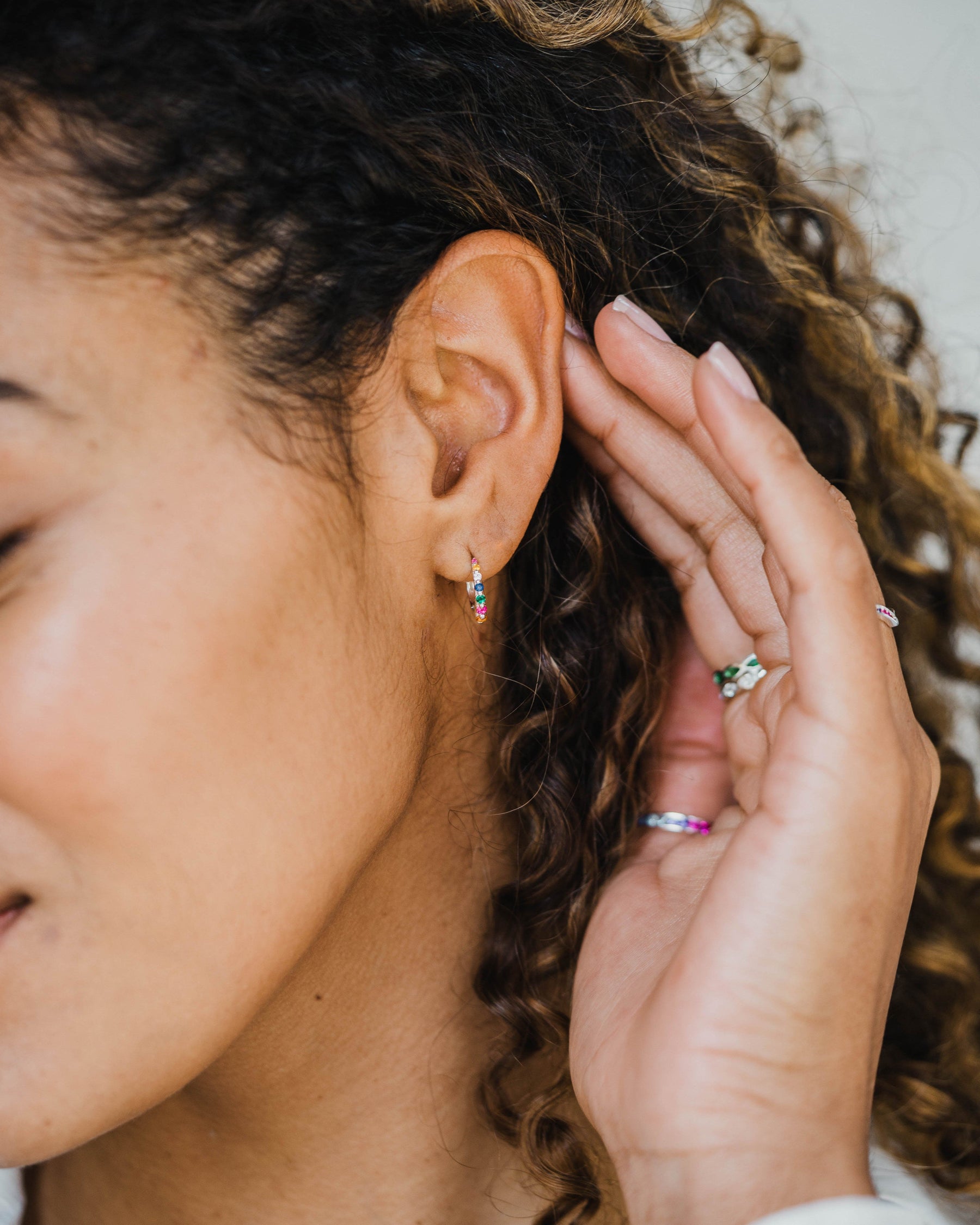 Sterling Silver and Rainbow Cubic Zirconia Graduated Huggie Hoops