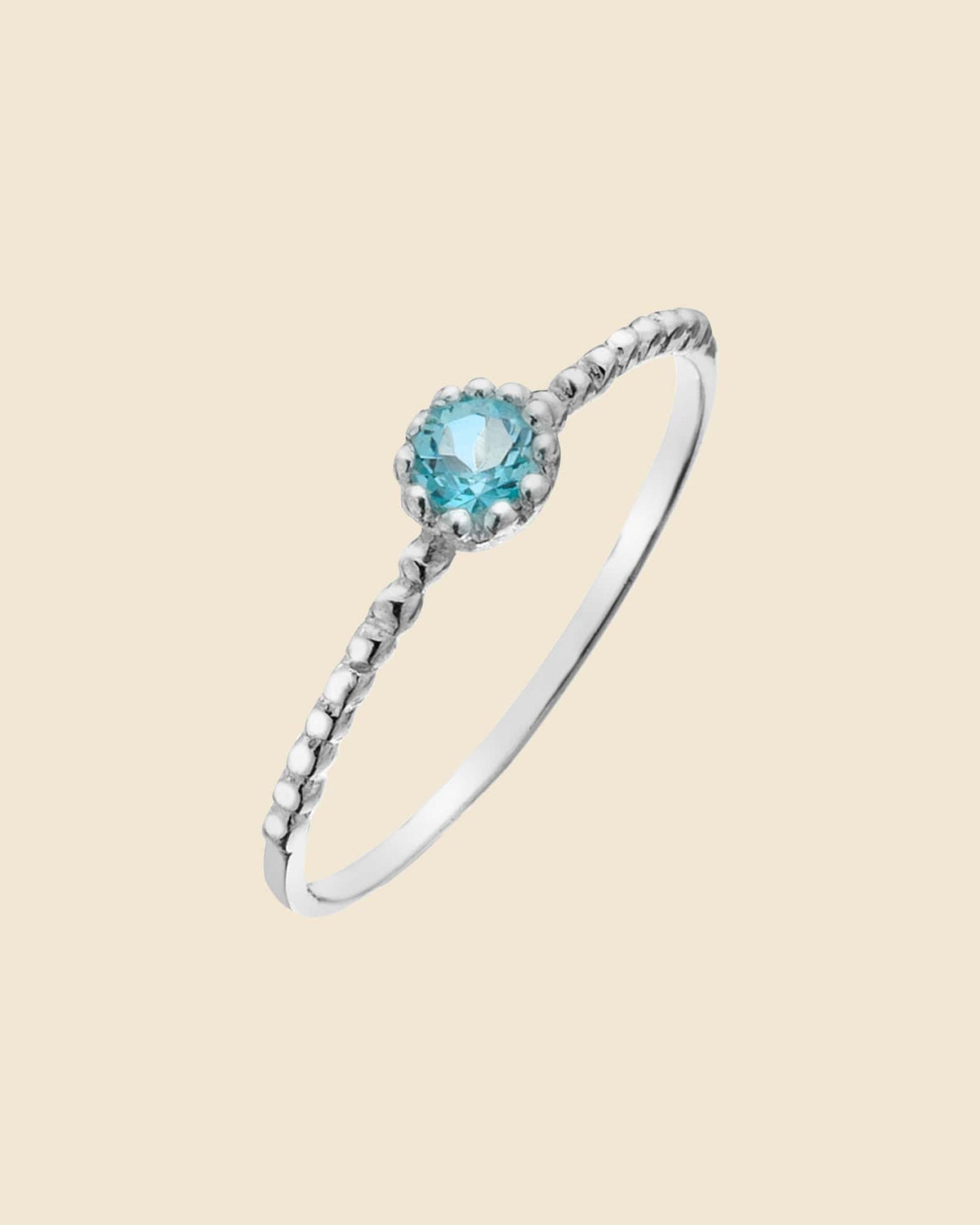 Sterling Silver and Blue Topaz Mini Solitaire Ring