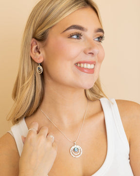 Sterling Silver and Paua Shell Hammered Ecliptic Pendant