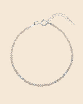 Delicate sterling silver and micro freshwater pearl beaded bracelet with an adjustable extender chain.