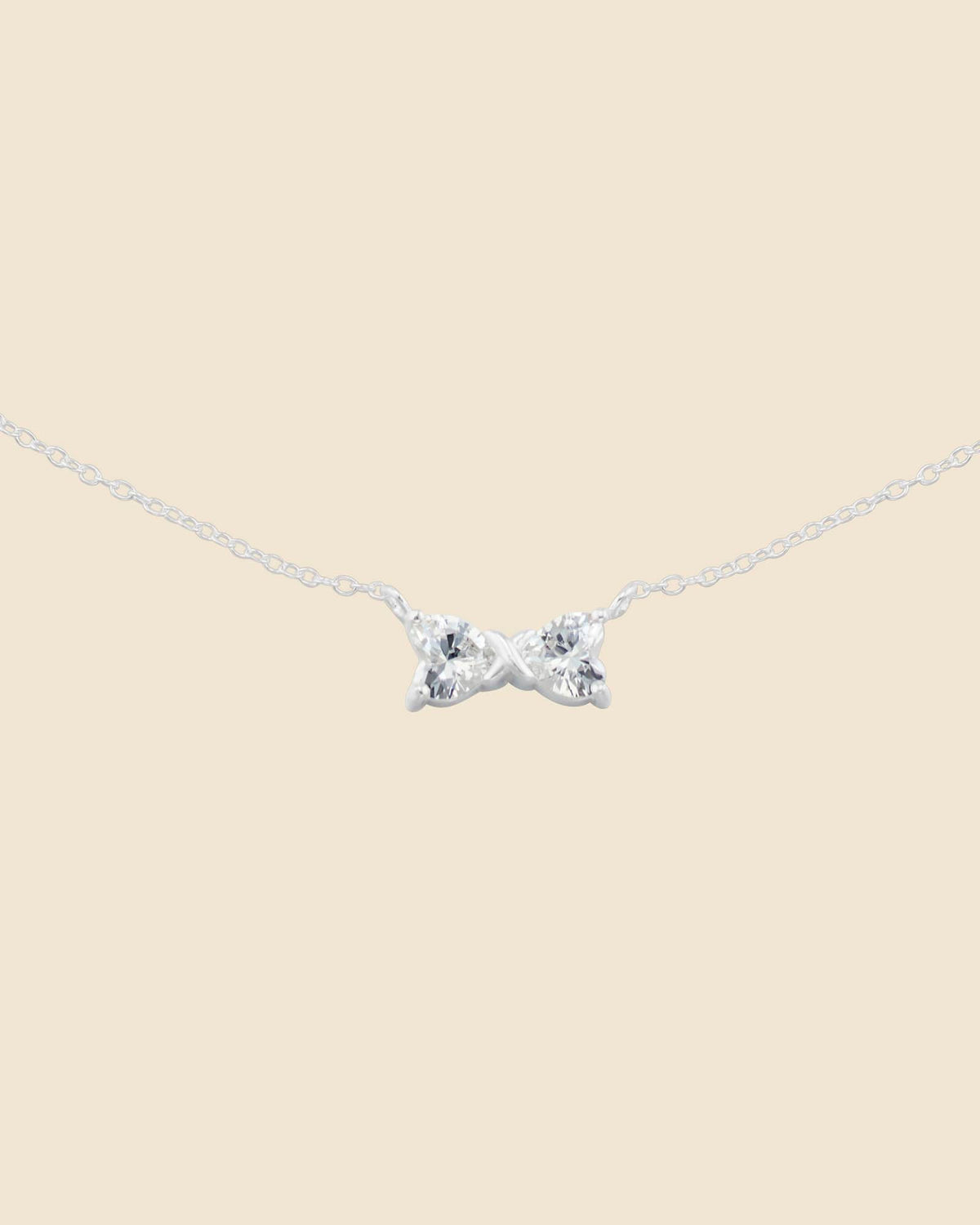 Sterling Silver and Cubic Zirconia Simple Bow Necklace
