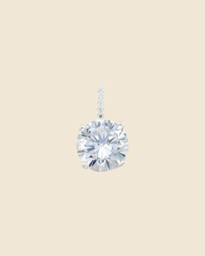 Large round solitaire cubic zirconia pendant in sterling silver with a sparkling pavé-set bale.