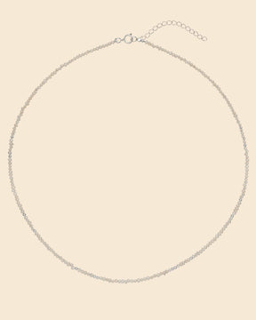 Sterling silver necklace with micro freshwater pearls and polished silver beads, featuring an adjustable extender chain.