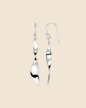 Polished sterling silver drop earrings featuring a sculptural, tapered twist design on simple hook fittings.