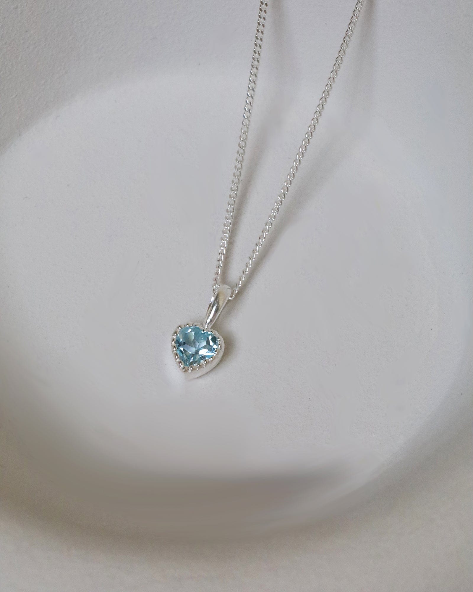 Sterling Silver and Blue Topaz Sweet Heart Pendant