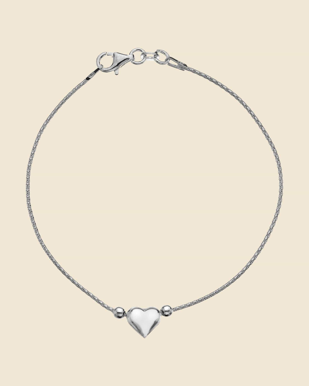 Sterling Silver Puffed Heart Trace Bracelet
