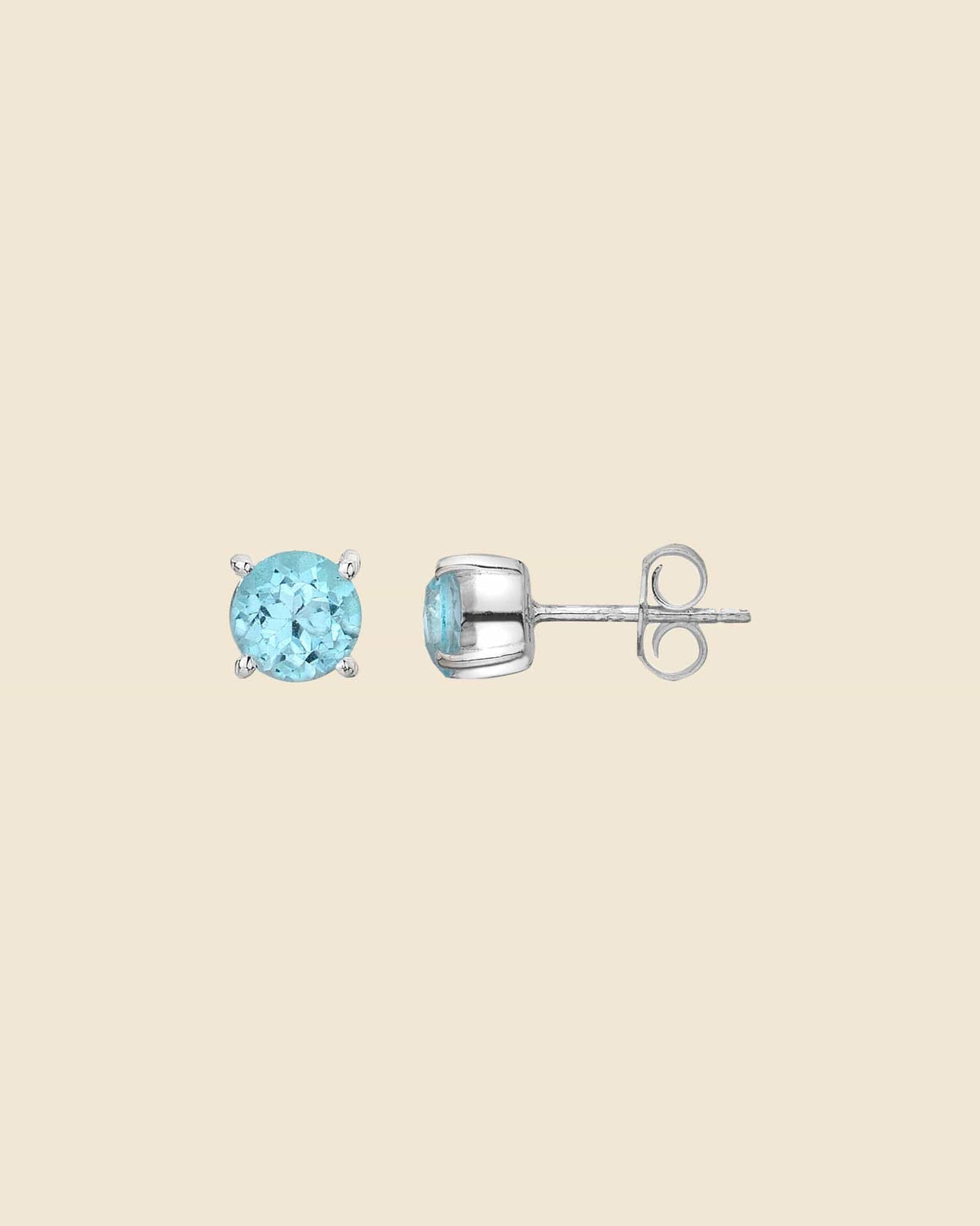 Sterling Silver and Faceted Blue Topaz Studs