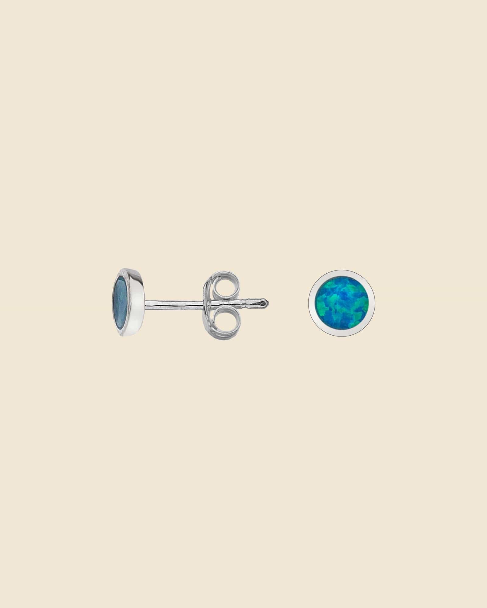 6mm sterling silver circle stud earrings featuring vibrant blue opal stones.