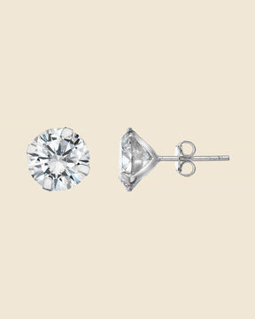 Brilliant cut cubic zirconia stud earrings in a sterling silver claw setting with post and butterfly backings.